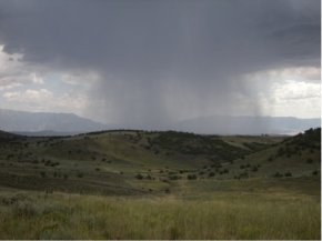 Watching storm clouds roll in during a chukar hunt.